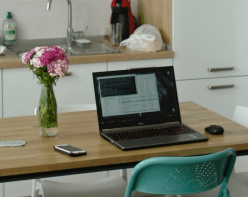 Laptop on kitchen table